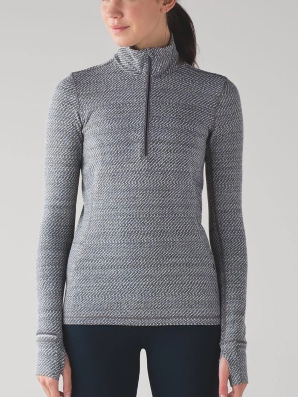 Lululemon Outrun 1/2 Zip, size 8
Heathered White/Heathered Black